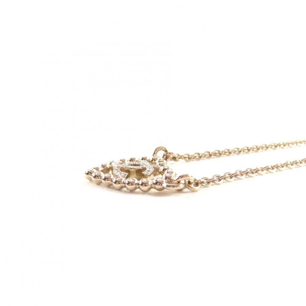 CHANEL Gold Logo Necklace - Picture 5 of 8